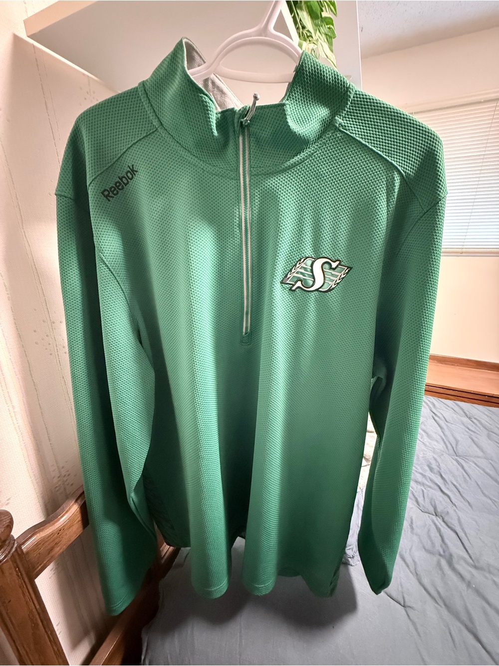 Reebok Men’s Green Sask Roughrider Athletic Jersey 3/4 zip.